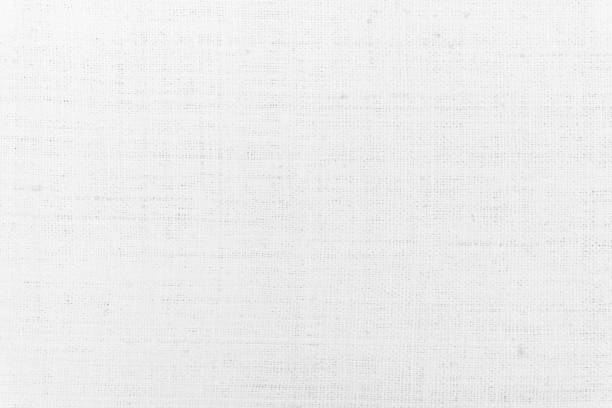 istock White Hemp rope texture background. Haircloth or blanket wale cloth wallpaper. Rustic sackcloth canvas fabric texture in natural. Natural vintage linen burlap weaving, Old cotton carpet background. 1295459837