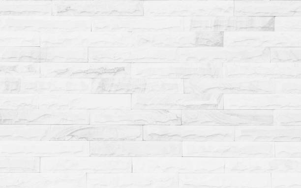 istock White grunge brick wall texture background for stone tile block painted in grey light color wallpaper modern interior and exterior and room backdrop design 1295460151