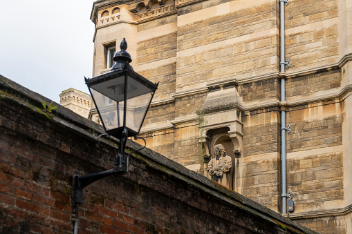 Carving above Caius College, Senate House Passage, Cambridge, England, UK.