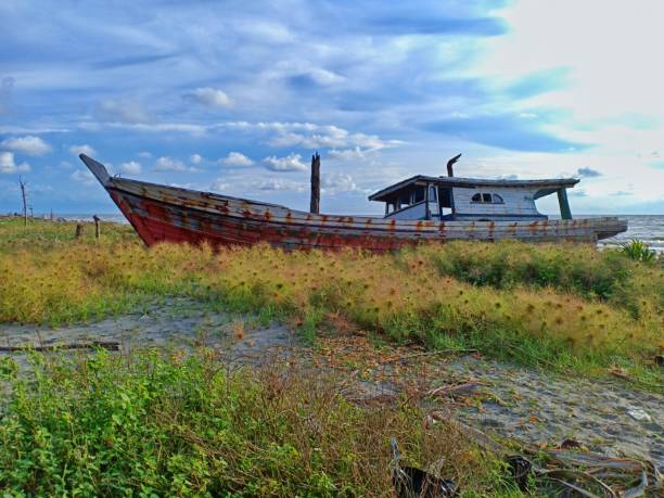 istock fishing boats that dock on the shore 1295464964