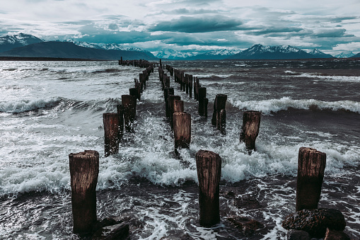 The remains of an old pier, now a resting place for seabirds. Puerto Natales, Chilean Patagonia.