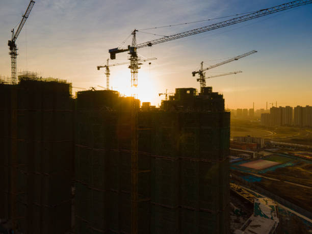 istock Aerial view of construction site at sunrise 1295470593