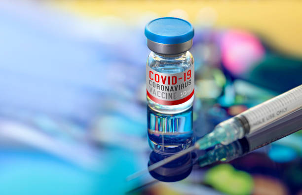 Vial ampoule vaccine for Corona Virus Covid-19 with syringe Vial ampoule vaccine for Corona Virus Covid-19 with syringe dystopia concept photos stock pictures, royalty-free photos & images