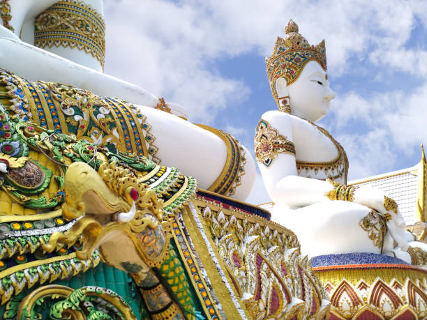 istock Big Buddha Statue, Wat Nong Pong Nok. Blue sky. 1295473850