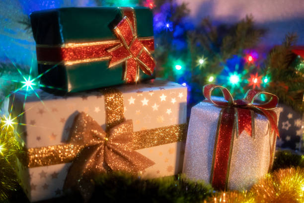 istock Christmas background with gift boxes. Presents with ribbons and bows, holidays concept. 1295473943