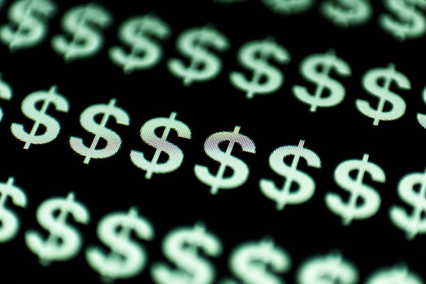 Currency Dollar symbol pattern on a black background. Monitor texture view. High quality photo