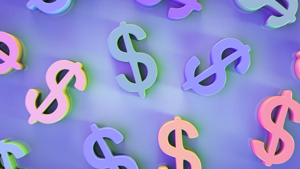 istock Financial background. Multicolored dollar symbols on the table. 1295477781