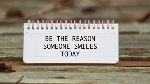 istock Life quotes - Be the reason someone smiles today 1295478161