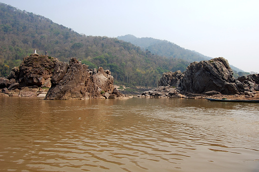 Scenic rocks on the riverbanks of Mekong in Laos.