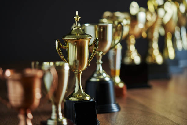 istock group of trophies in a row 1295484208