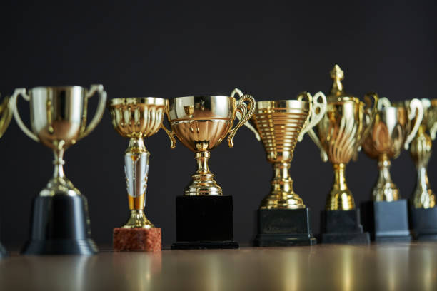 istock group of trophies in a row 1295484211