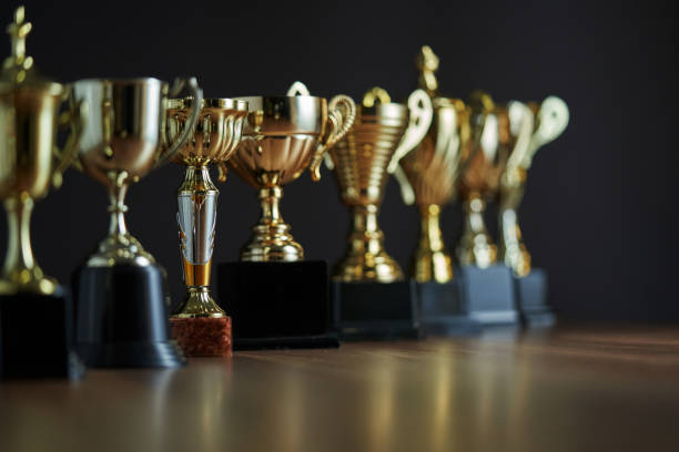 istock group of trophies in a row 1295484218