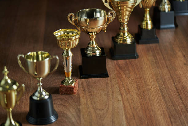 istock group of trophies in a row 1295484221