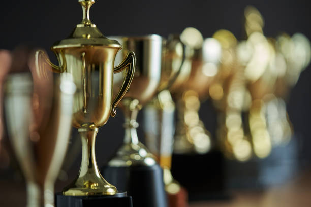 istock group of trophies in a row 1295484226