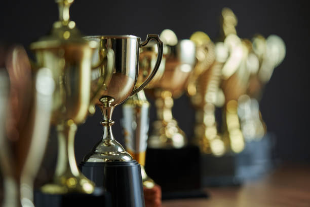 istock group of trophies in a row 1295484227
