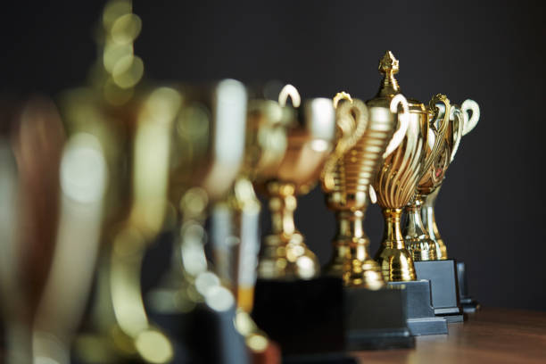 istock group of trophies in a row 1295484231