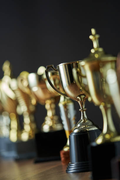 istock group of trophies in a row 1295484236