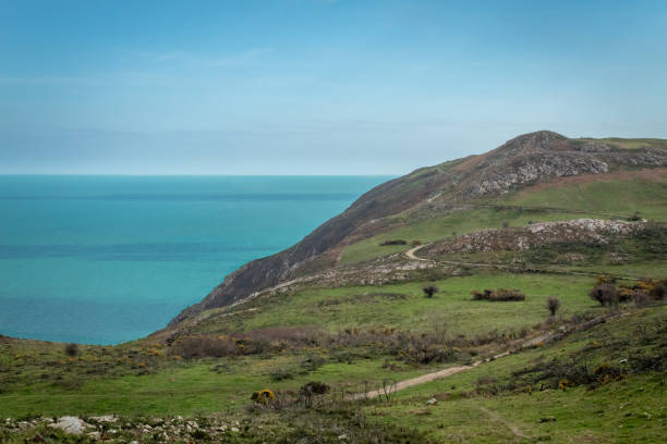 istock Sea View Following Winding Pathway Across South Bray Head 1295487965