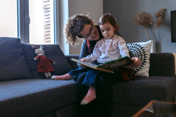 istock Young mother playing with her child at home. 1295489246