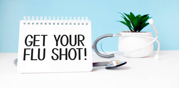 istock The text get your flus shot is written on notepad near a stethoscope on a blue background. Medical concept 1295489751
