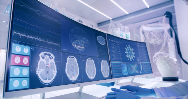istock Laboratory equipment, microscope and computers. Brainwave research on screens. Side view of scientist 1295492956