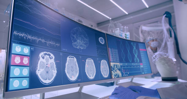 istock Laboratory equipment, microscope and computers. Brainwave research on screens. Side view of scientist 1295492969
