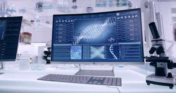 istock Futuristic laboratory equipment. DNA helix model on screen 1295493006