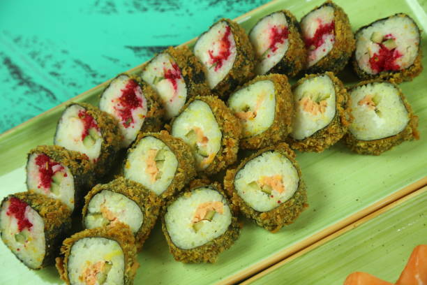 istock Various kinds of sushi served, close-up view 1295494670