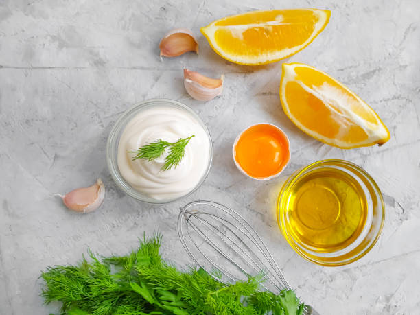 istock fresh mayonnaise on concrete background 1295495759