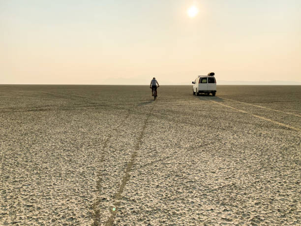 istock Van camping in deserts and mountains on fun road trip 1295496511