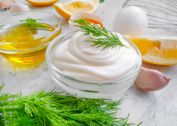 istock fresh mayonnaise on concrete background 1295496627