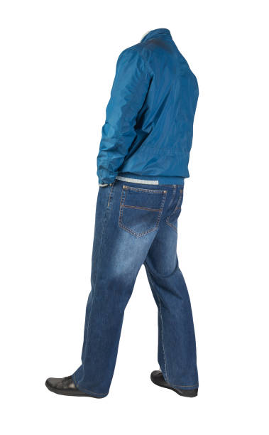 istock dark blue jeans, black leather shoes, jacket isolated on white background. 1295501021
