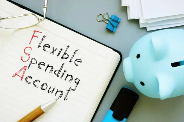 Photo of Flexible Spending Account FSA is shown on the conceptual business photo using the text