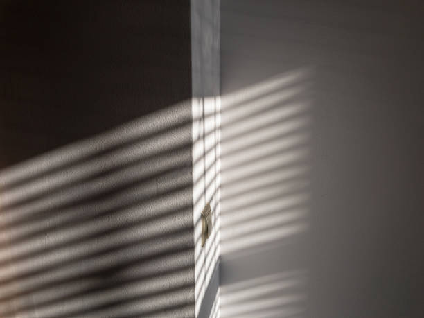 istock Shadow floor. Abstract light, black shadow overlay from window on white texture wall. Sunlight architecture background. Overlay effect for photo and design. 1295506969