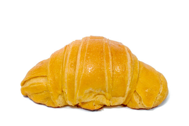 Classic croissant bun isolated on a white background.