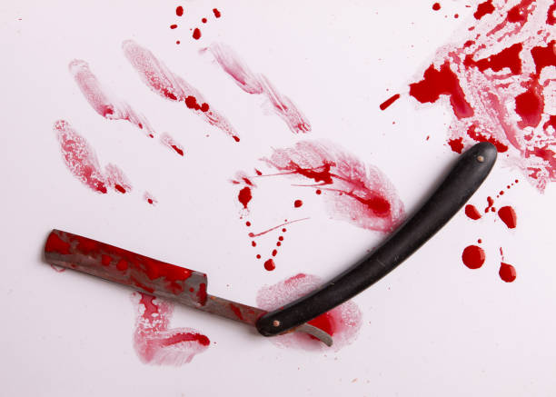 istock Razor sharp and blood. An old razor and blood. 1295513246