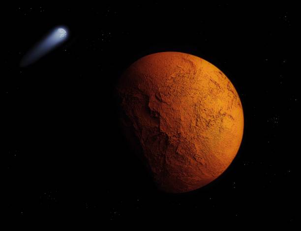istock Red planet, covered with mountains and canyons in space with comet and stars. 1295515536