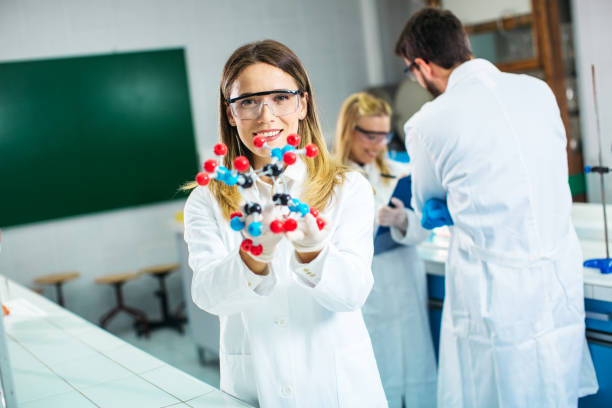 istock Young Scientists at the laboratory looking at dna 1295517542