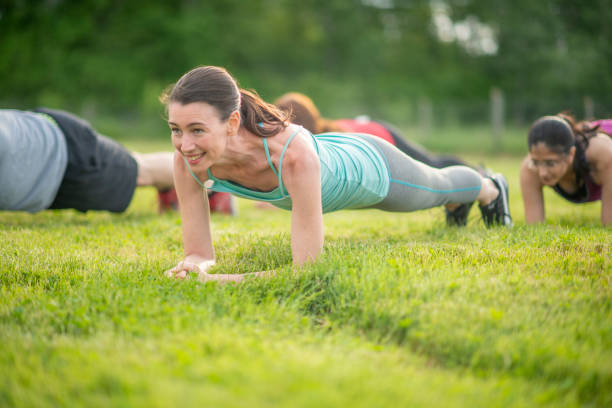 istock Athletic female in planking position 1295518469