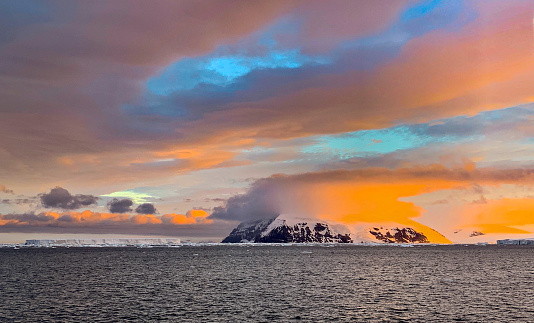 A scenic view of the Antarctic peninsula taken at dusk.