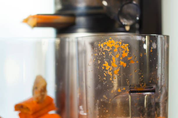 istock juicer screw juice from carrots 1295520585