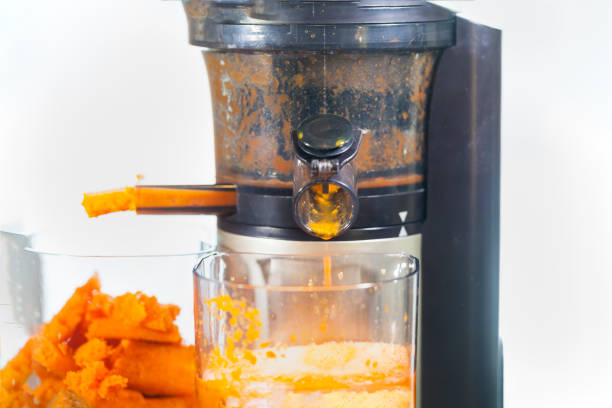 istock juicer screw juice from carrots 1295520588