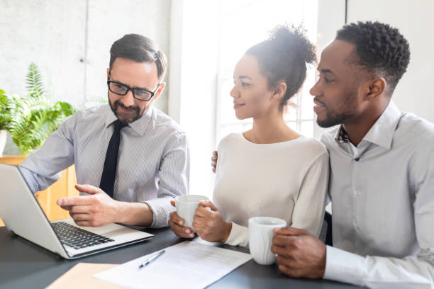 family couple consultations with a lawyer or insurance agent. - lawyer family talking discussion imagens e fotografias de stock