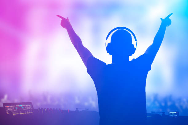 istock Charismatic disc jockey at the turntable. 1295525451