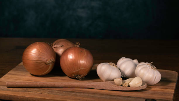 istock Oions and Garlic ready to prepare for a meal. 1295526119