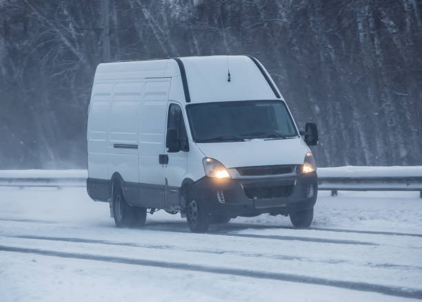 istock Minibus moves in the winter on highway 1295528600