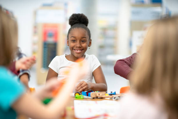 istock Smiling elementary age African girl 1295529789