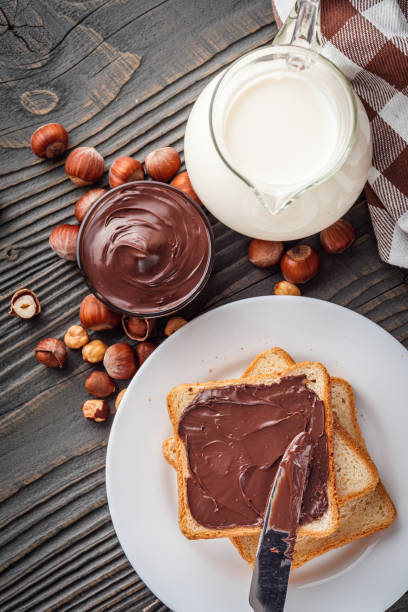 istock toasts with chocolate butter on a dark wooden rustic background 1295530477