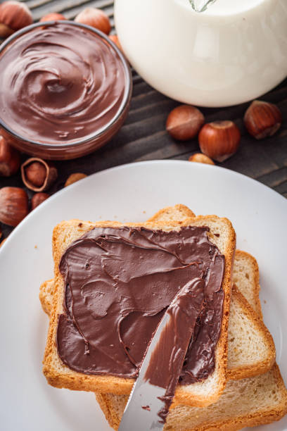 istock toasts with chocolate butter on a dark wooden rustic background 1295530517