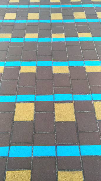 istock Sidewalk tiles with a pattern, covering the pedestrian area 1295533998